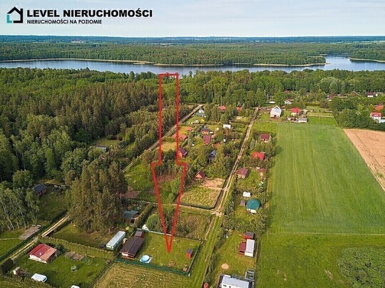 LEVEL NIERUCHOMOŚCI Działka nad jeiorem z domkiem 