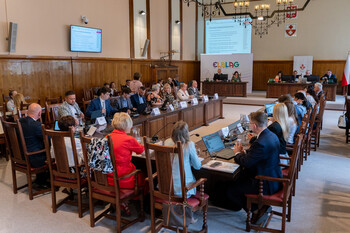 > Delegaci i przedstawiciele